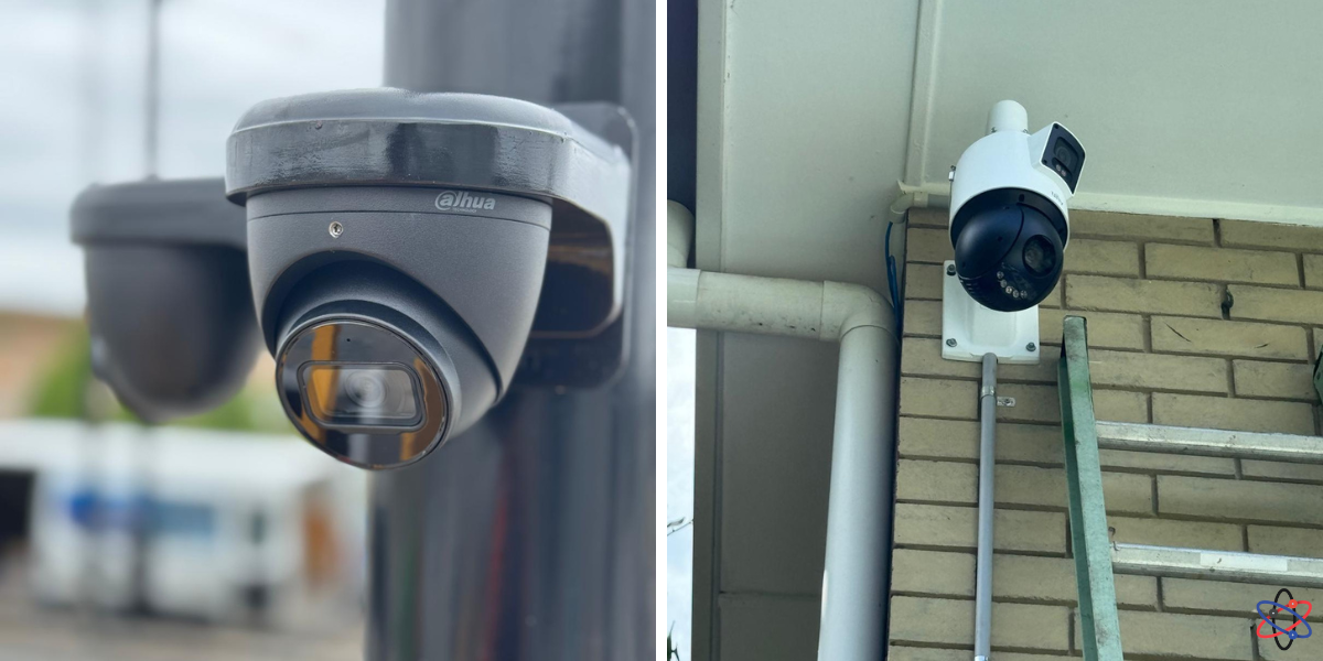 Image of two security cameras mounted on a pole, symbolizing 24/7 surveillance for enhanced property protection.